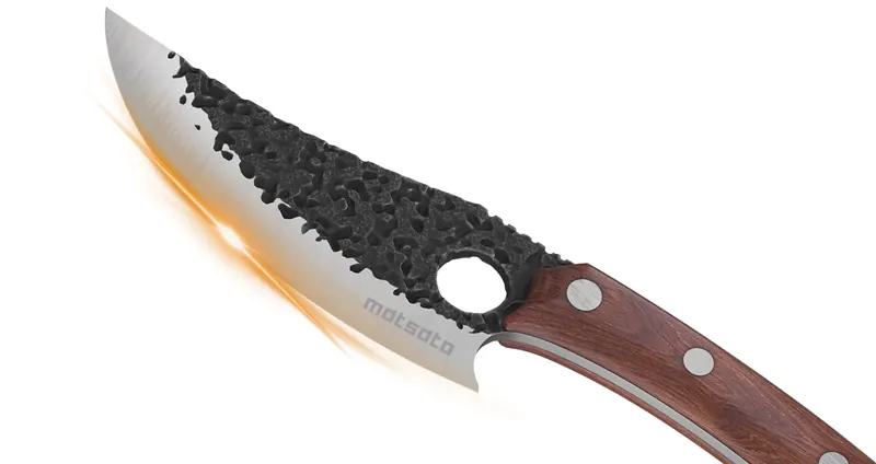 Close-up of the Matsato Chef Knife's blade, finger hole, and wood handle