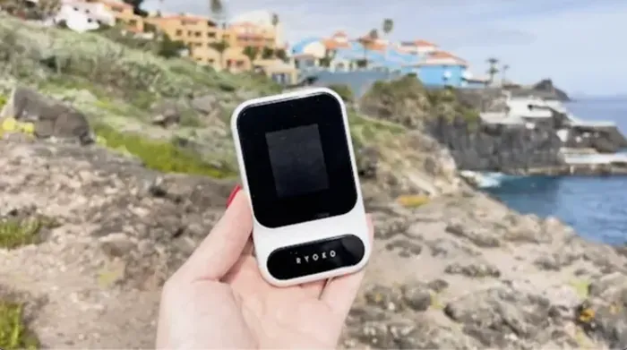 Ryoko Pro hotspot held outdoors while traveling
